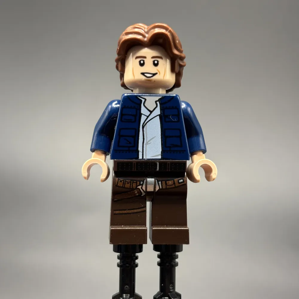 Han Solo, Dark Brown Legs with Holster Pattern, Dark Blue Jacket, Wavy Hair, Smile / Frown