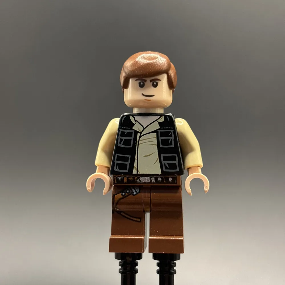 Han Solo - Black Vest with Pockets over Tan Shirt with Dark Tan Creases, Reddish Brown Legs with Belts