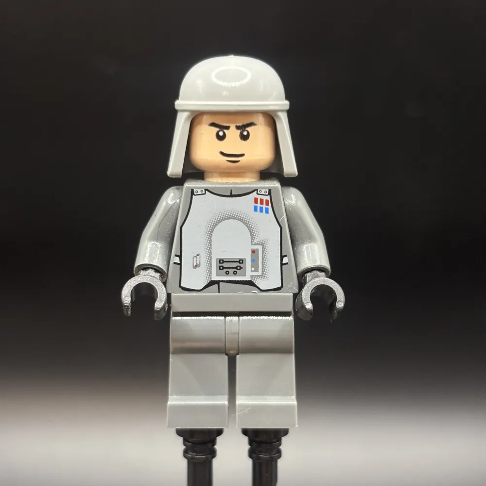 Imperial Officer with Battle Armor (Captain / Commandant / Commander) - Dark Bluish Gray Legs, Smirk