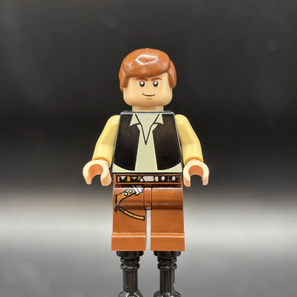 Han Solo - Black Vest over Tan Shirt, Reddish Brown Legs with Belts, Eyes with Glints